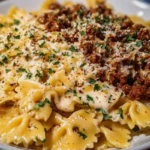 Cheesy Bowtie Pasta with Savory Cajun Ground Beef in Garlic Cream 1