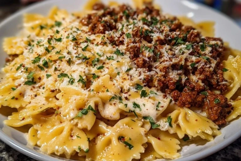 Cheesy Bowtie Pasta with Savory Cajun Ground Beef in Garlic Cream 1