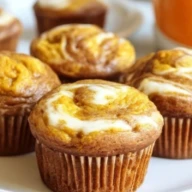 Fluffy Pumpkin Cream Cheese Swirl Muffins