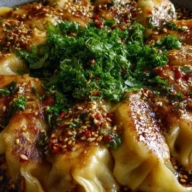 Oven-Baked Dumplings with Peanut Sauce